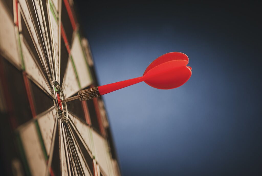 Red dart in the center of a target