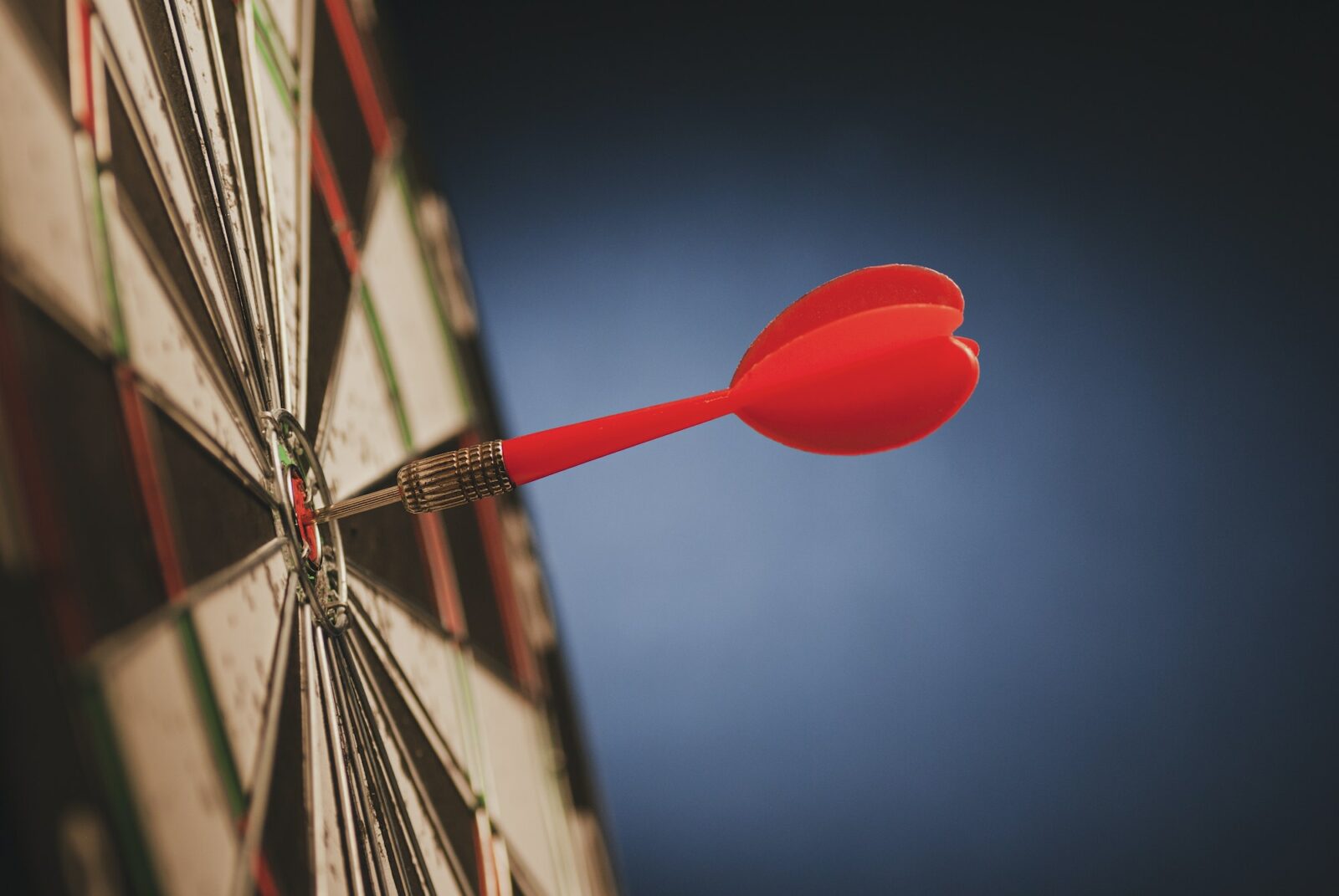 Red dart in the center of a target